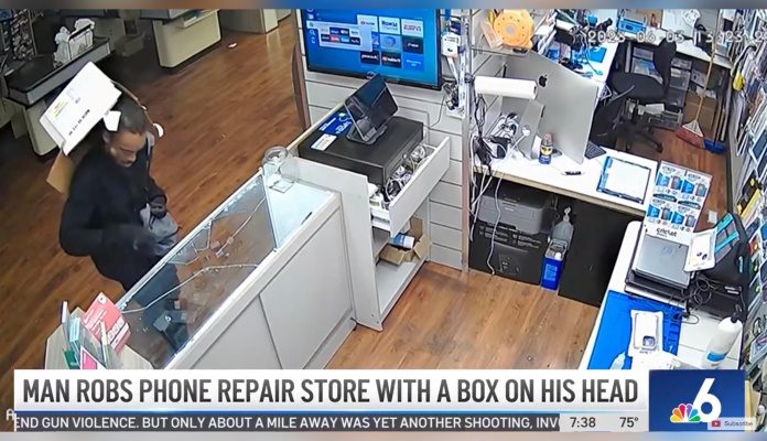 Funny iPhone Robbery Tried To Camouflage With A Cardboard