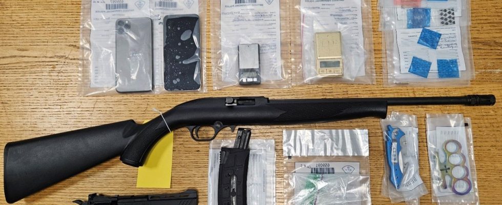 Three face charges after drugs weapons seized by police in