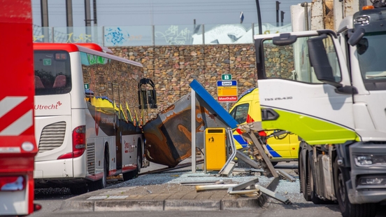 Truck driver drives into bus shelter in Breukelen three people