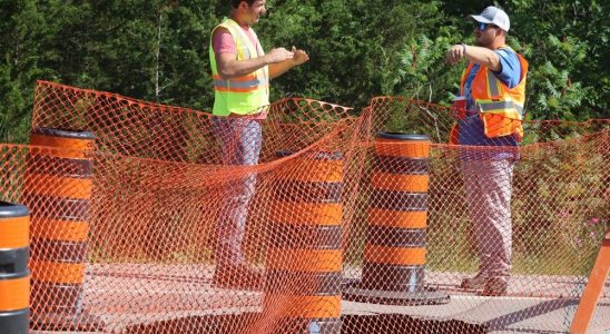 Golf cart sized sinkhole knocks out stretch of busy Lambton road