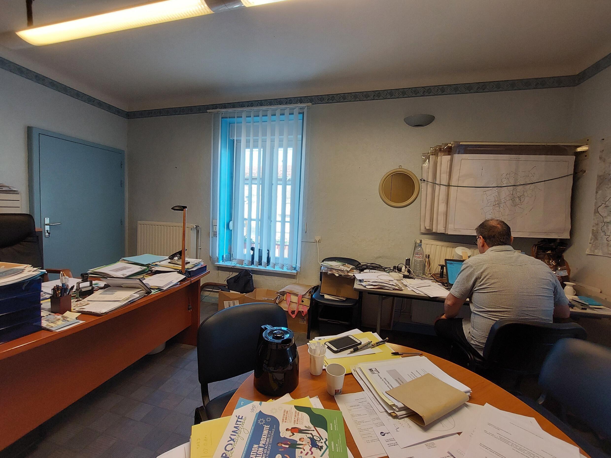 Pascal Jost never stops.  On his desk, in town hall, the files pile up.