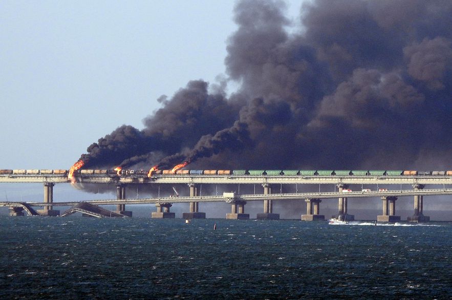 The bridge connecting Russia and Crimea in flames after a truck bomb attack, October 8, 2022 