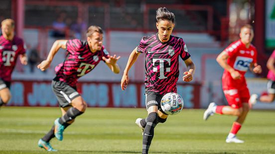 FC Utrecht players Boussaid Brouwers and Mamengi on their way