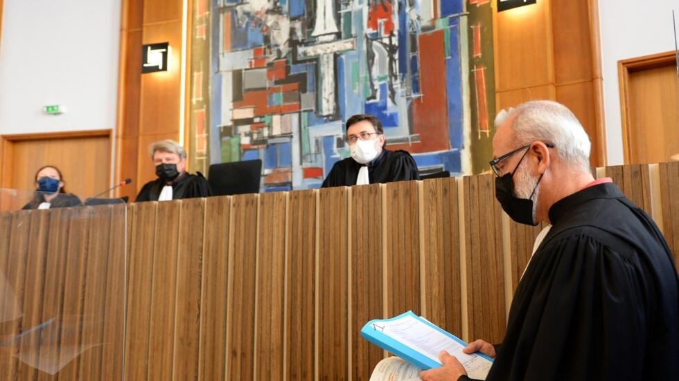 The court usher takes part in the opening of the trial of the spectator responsible for the massive fall of the peloton of Tour de France riders in 2021.