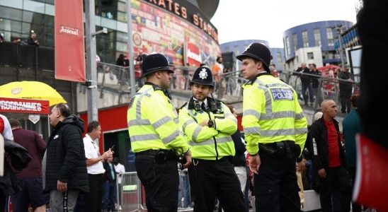 London police surrender weapons after murder charge