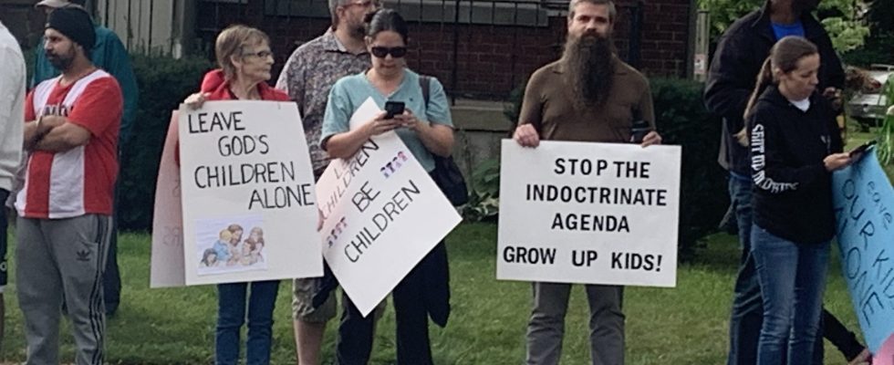 Protesters counter protesters converge on London school board HQ