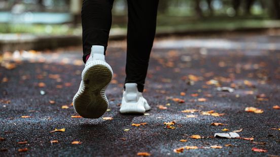 Runner is threatened and jumps into a canal police are