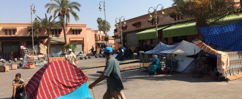 in a district of Marrakech many families continue to sleep