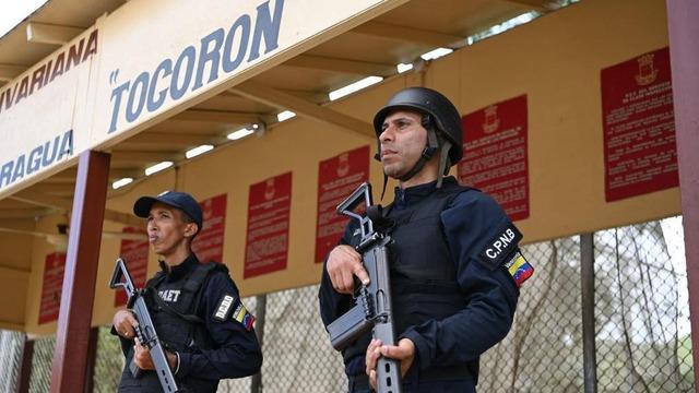 Armed guards are currently guarding the prison. 