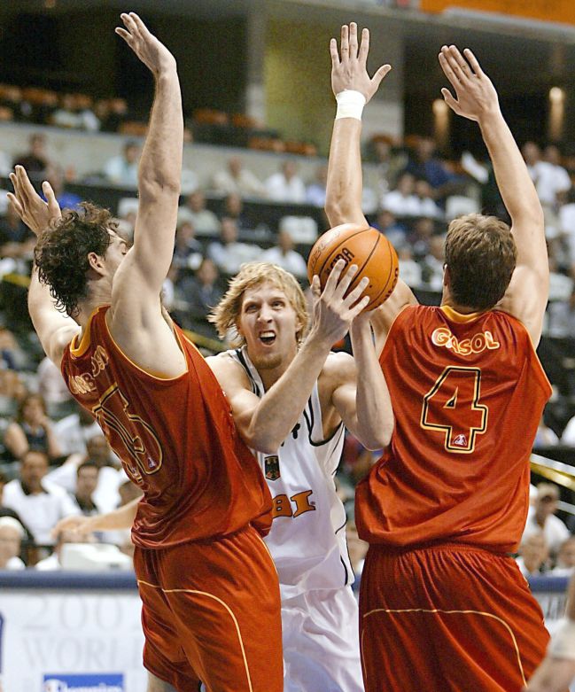 Dirk Nowitzki, with Germany, against Jorge Garbajosa and Pau Gasol.