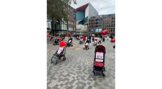 Empty buggies and bloody dolls at Vredenburg in Utrecht because