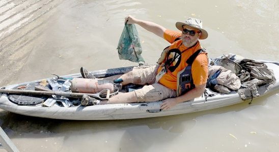 Fire extinguisher pull cart among items found by paddlers in