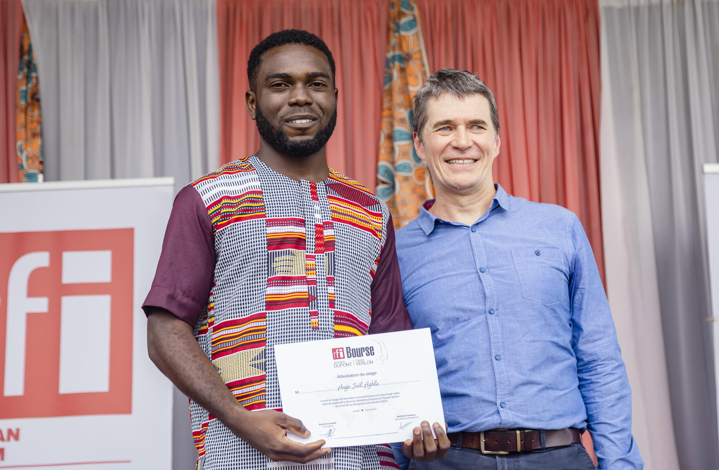 Ange Joël Agbla and Jean-Marc Four, director of RFI.