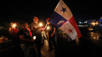 A man shot two environmental activists blocking the highway in