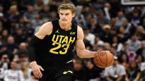 Lauri Markkanen in great spirits flashed his hand received