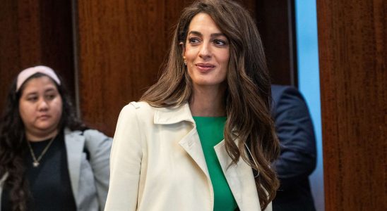 Even in the pouring rain Amal Clooney remains the most