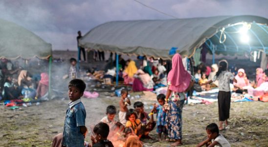 Rescue refugees in a boat in the Indian Ocean