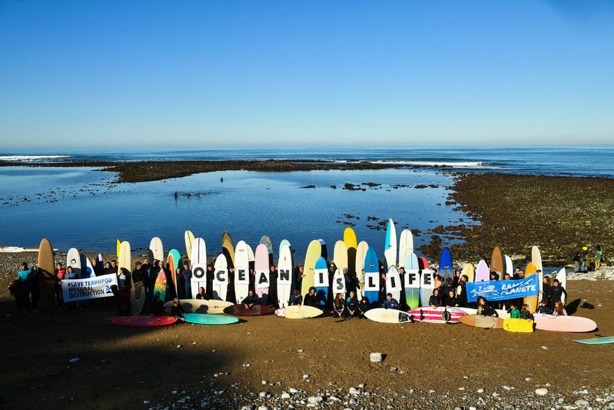 Surfers demonstrate against the construction in Tahiti of a new judges' tower for the 2024 Olympic Games, on December 17, 2023 in Guéthary (Pyrénées-Atlantiques)