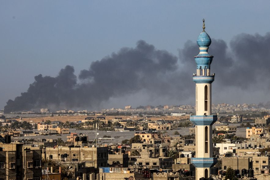 A photo taken from Rafah showing a cloud of smoke rising on January 22, 2024 above Khan Younes in southern Gaza after fighting between the Israeli army and the Palestinian Islamist group Hamas