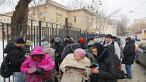 An opposition politician collects names in Russia to get to