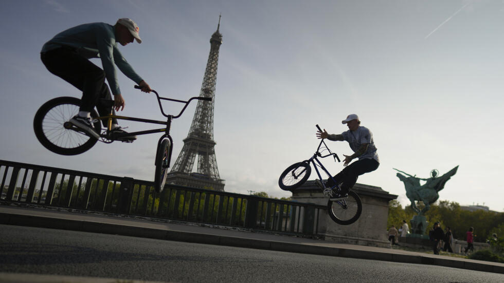 BMX riders, Yurii Illuschenko of Ukraine, left, and Keiran Reilly of England, at a training session, in Paris, Thursday September 28, 2023.