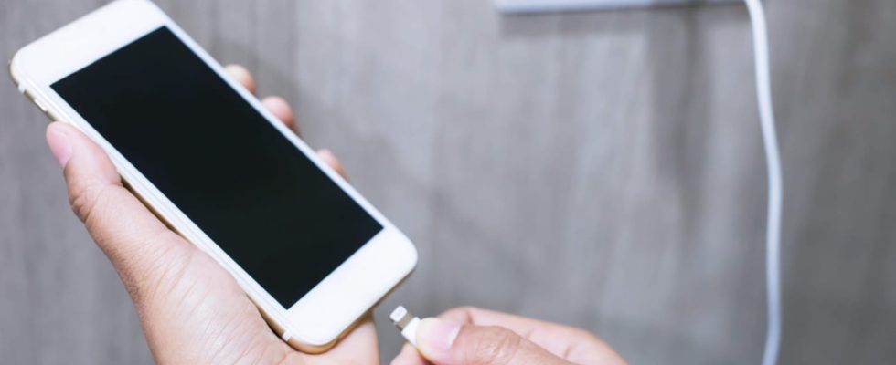 By charging your phone in an airport or train station