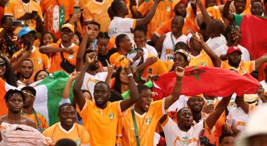 celebration and tears blues and joy of supporters between Abidjan