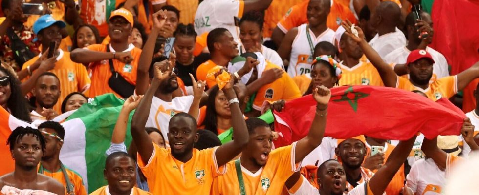 celebration and tears blues and joy of supporters between Abidjan