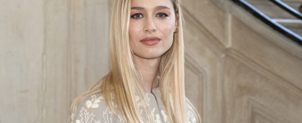 On the arm of her husband Beatrice Borromeo overshadows her