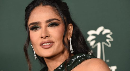 Tuxedo jacket metallic corset and dizzying neckline Salma Hayek redefines