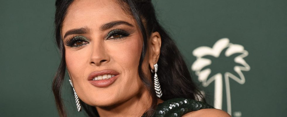 Tuxedo jacket metallic corset and dizzying neckline Salma Hayek redefines