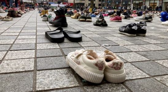 With thousands of childrens shoes demonstrators want to make suffering