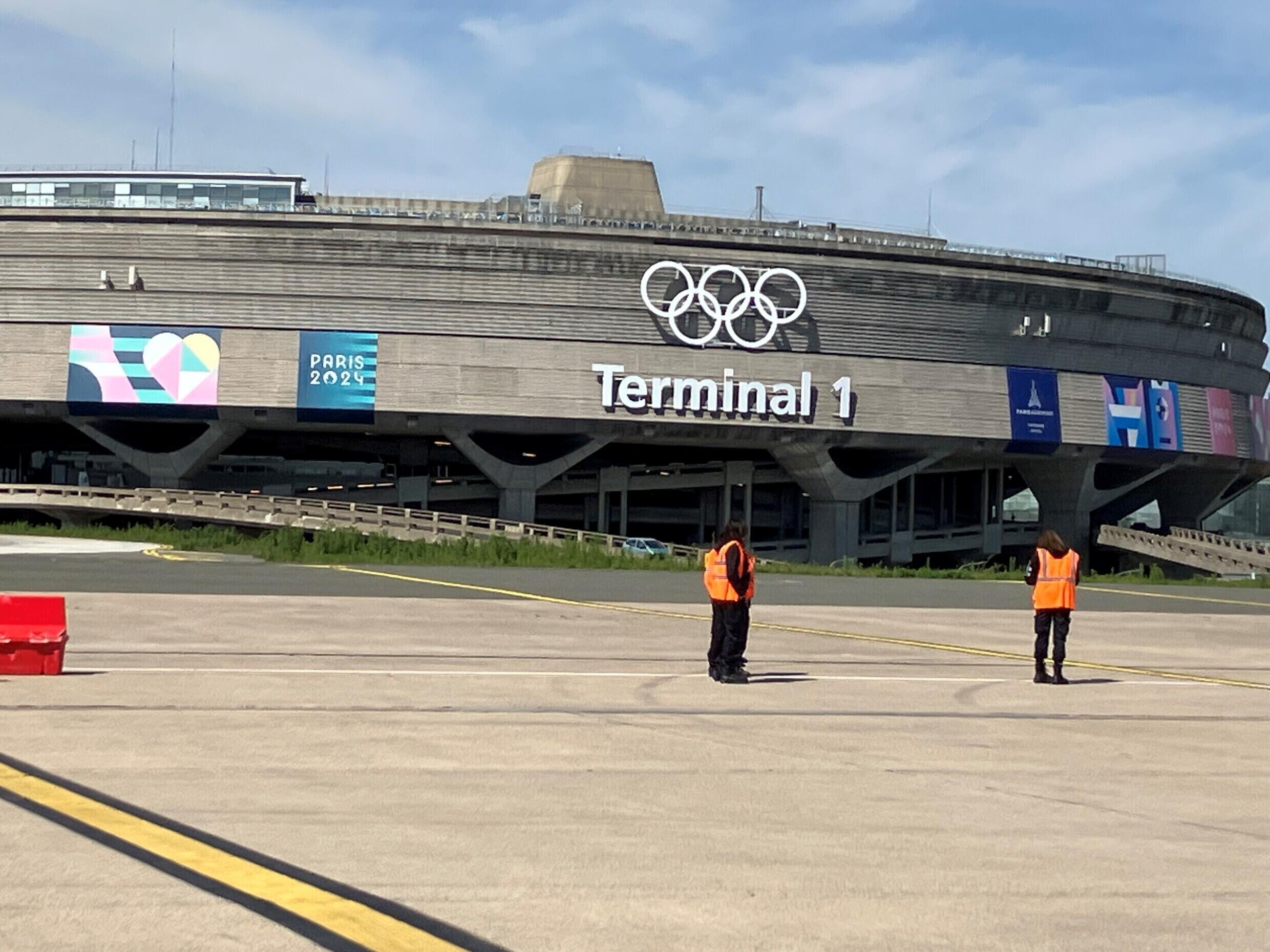 The Olympic rings proudly sit on the pediment of terminal 1 of Roissy-Charles-de-Gaulle airport, May 16, 2024.