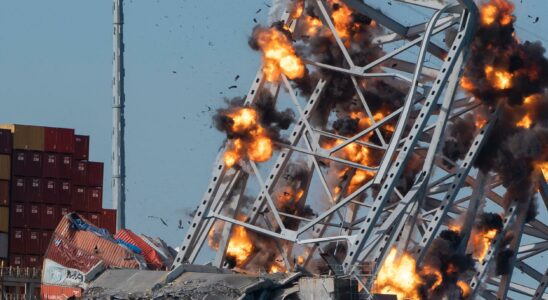 Collapsed bridge blown up to free ships