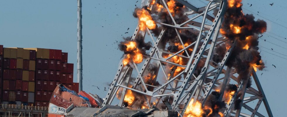 Collapsed bridge blown up to free ships