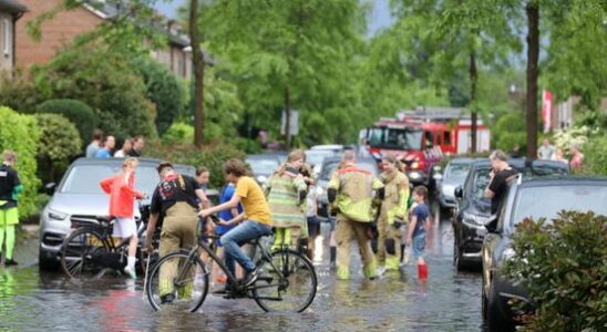 Flooded streets and fallen trees due to heavy thunderstorms