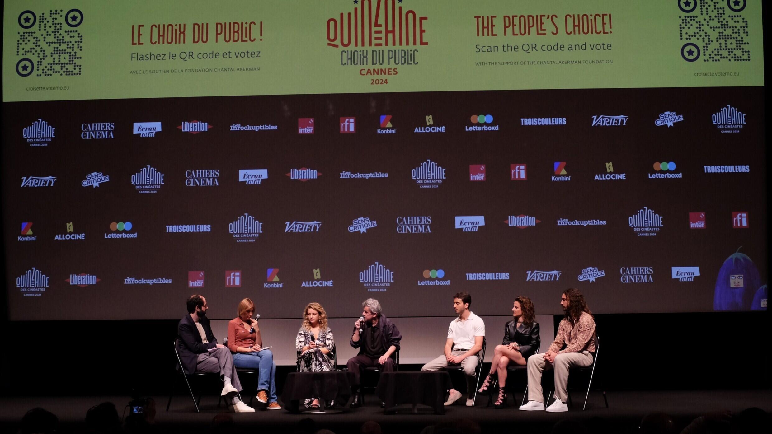 Thierry de Peretti, the director of the film “À son image” with his actors and actresses after the world premiere of the film at the Directors' Fortnight at the 2024 Cannes Film Festival.