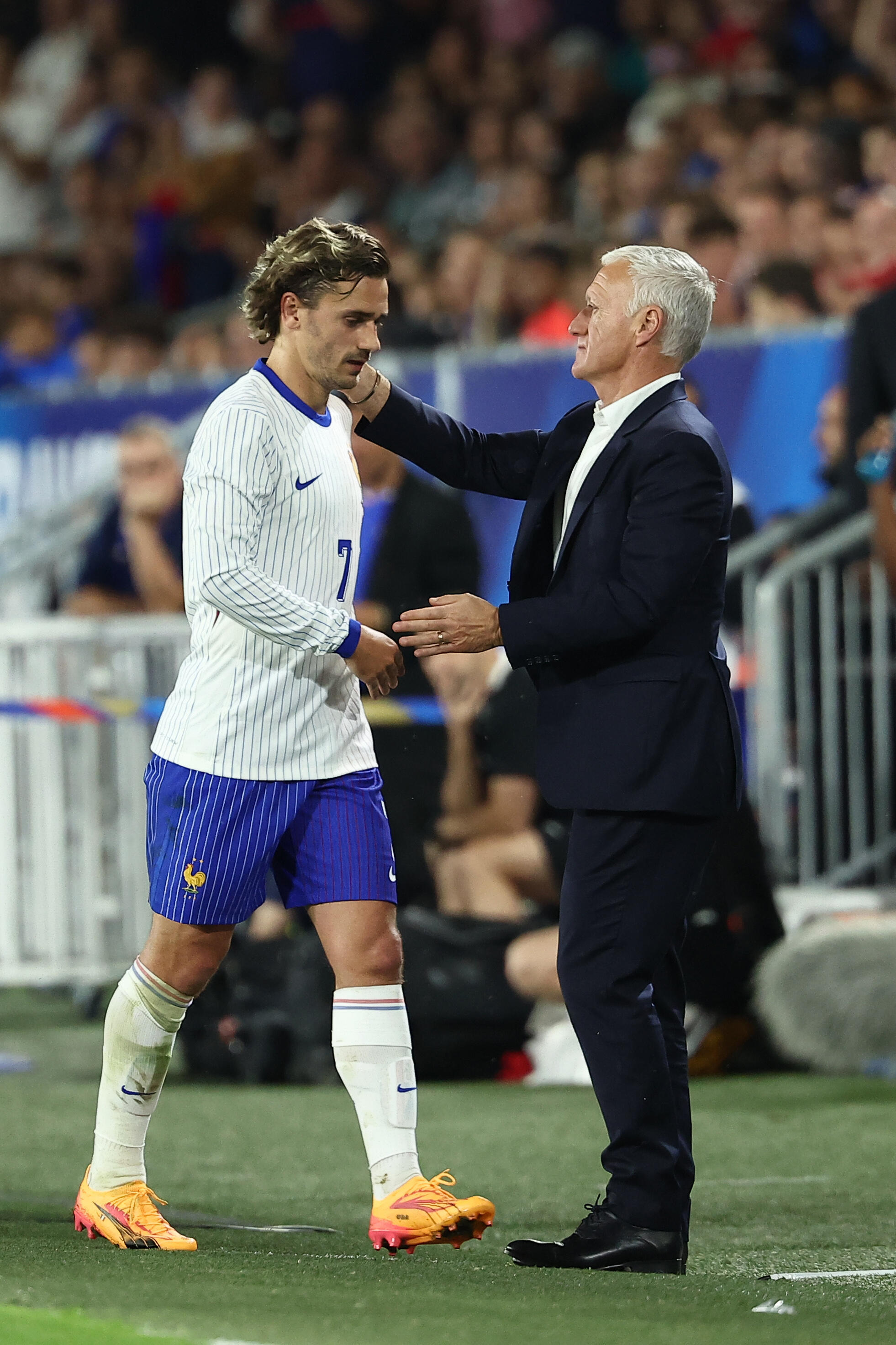 Coach Didier Deschamps (right) and French midfielder Antoine Griezmann (left) during a friendly match against Canada at Matmut Atlantique in Bordeaux, June 9, 2024