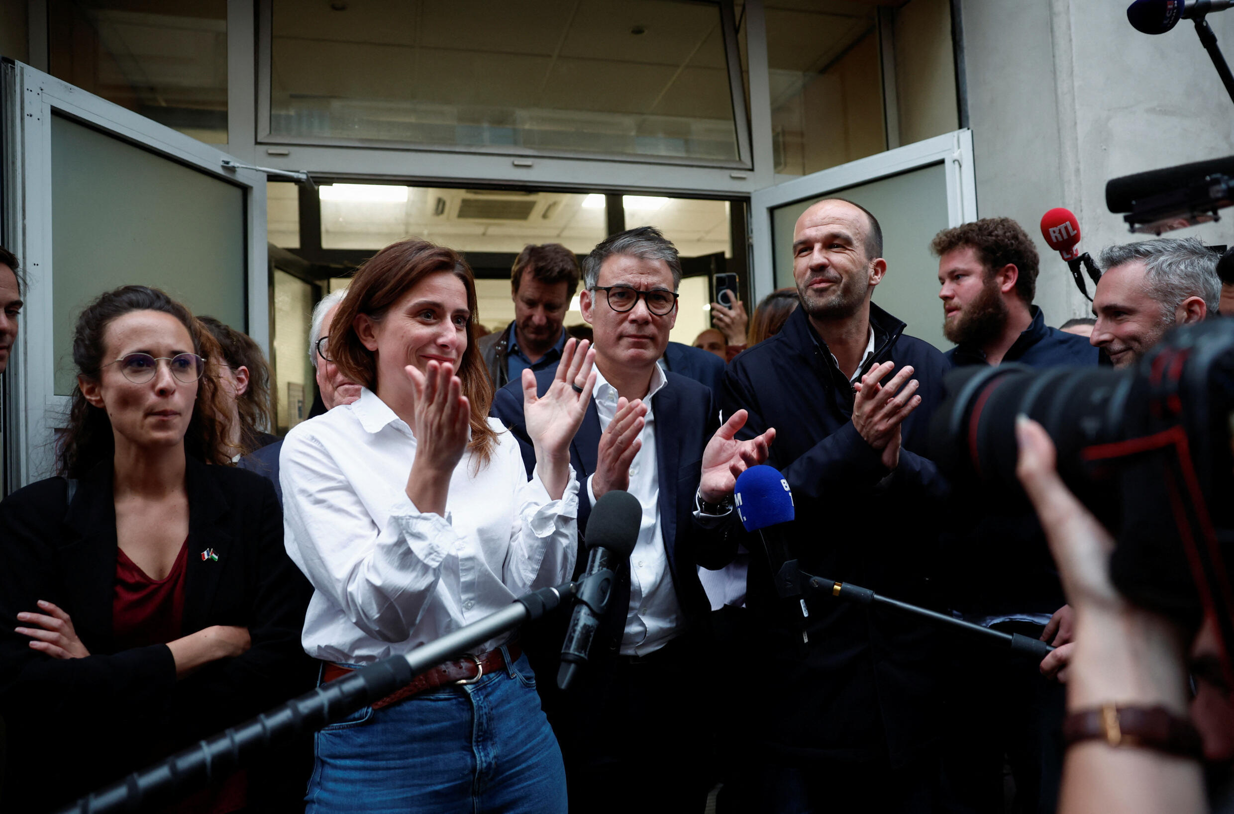 Olivier Faure, First Secretary of the French Socialist Party, Manuel Bompard, Coordinator of the Operational Team of the French far-left opposition party La France Insoumise (La France Insoumise - LFI) Marine Tondelier, National Secretary of the Ecologists (Les Écologistes - Les Verts) party, pose for a photo after the announcement of the alliance of left-wing parties in Paris, France, June 13, 2024. REUTERS/Stephane Mahe