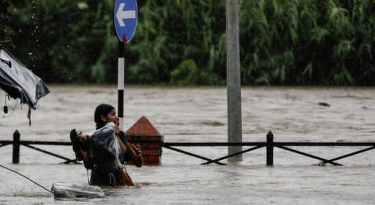 Floods and landslides kill at least ten people