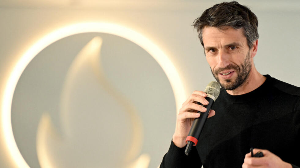 French President of the Paris 2024 Olympic and Paralympic Games Organising Committee (Cojop) Tony Estanguet delivers a speech during a press conference three months before the Olympic Games at the Paris 2024 Olympic Games headquarters in the suburb of Saint-Denis on April 10, 2024.