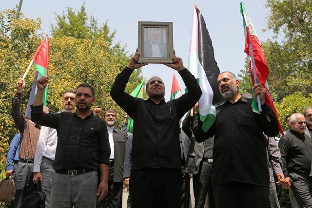 AA-20240731-35279311-35279301-HAMAS_LEADER_HENIYYENIN_IRANDA_ASSASSINATION_TRIAL_PROTESTED_IN_TEHRAN_UNIVERSITY