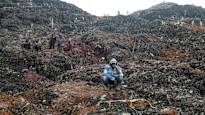 Already 30 dead dozens missing in Uganda landfill landslide