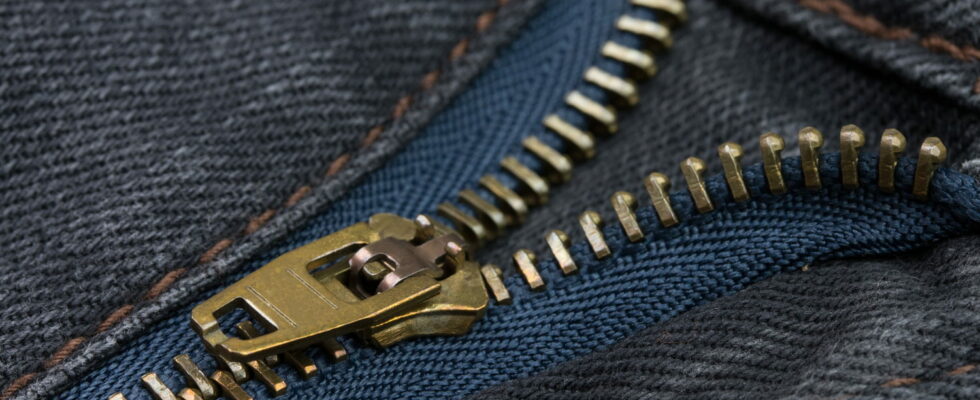 But what is hidden behind this YKK marking on the