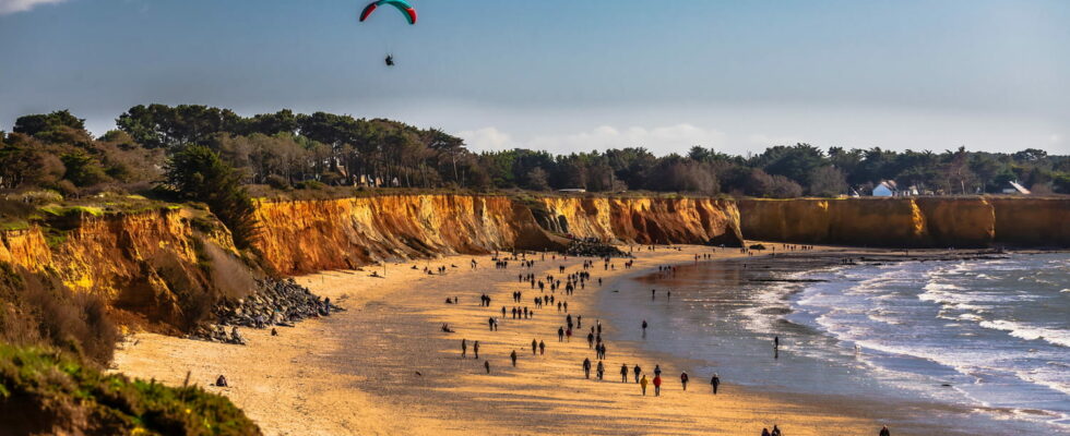 This French beach with its unique ochre cliffs is a