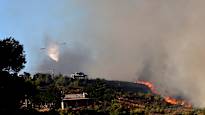 Thousands are being evacuated from the wildfires near Athens