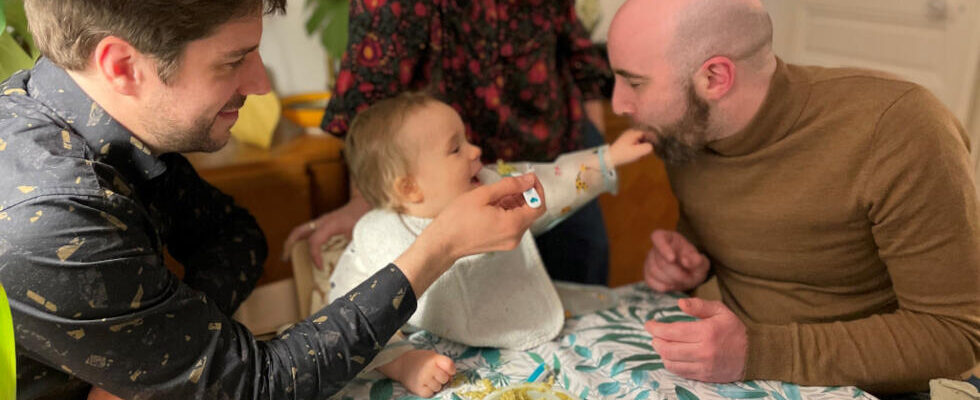 Three parents and a bassinet