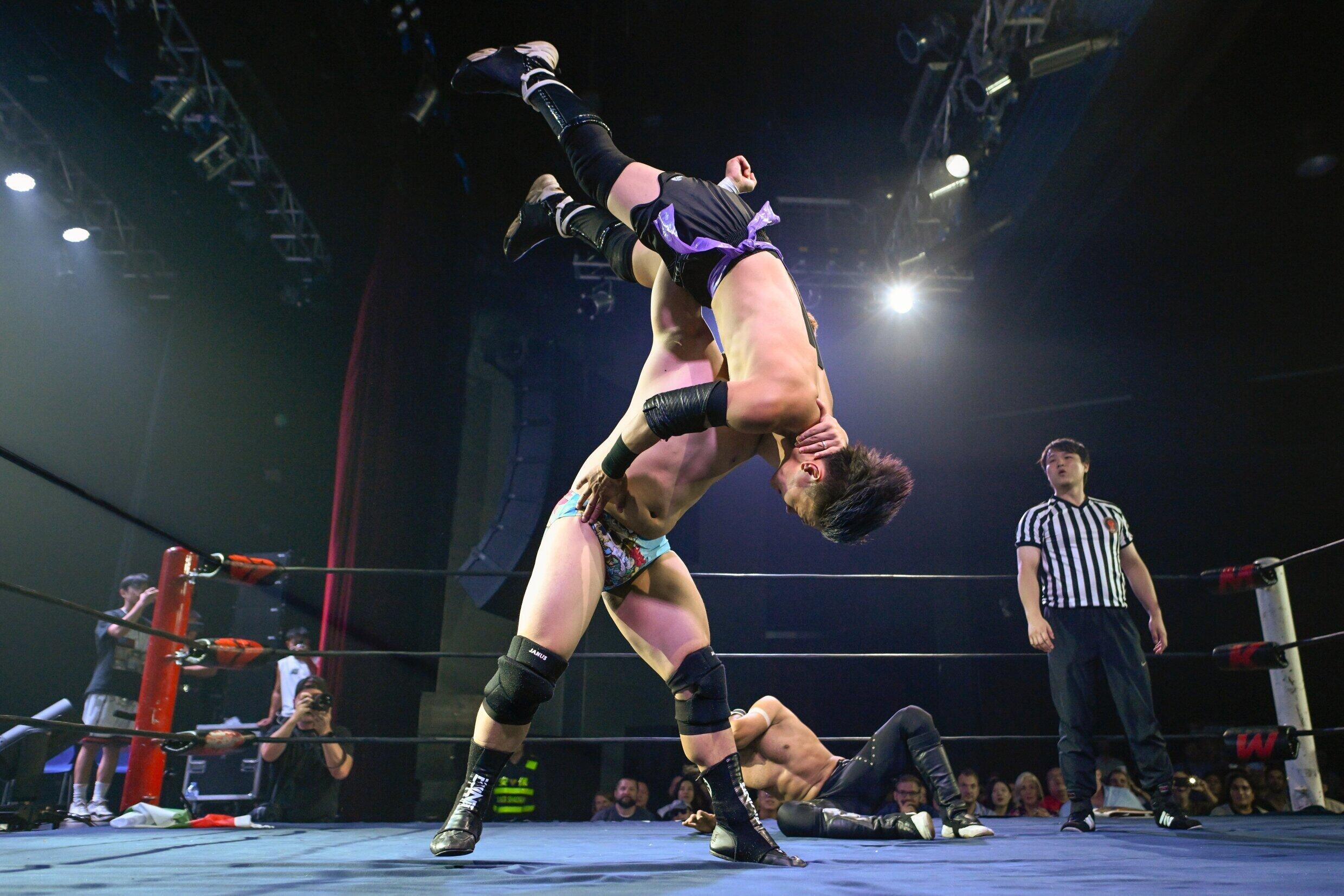 Wang Tao (c) fights against his opponent during a Middle Kingdom Wrestling (MKW) championship on September 14, 2024 in Shanghai.