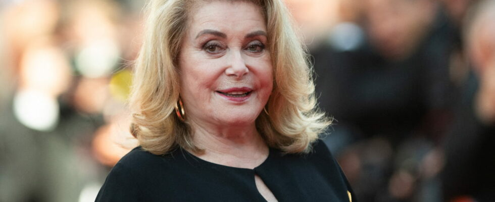 At 80 Catherine Deneuve ditches her signature blow dry for a