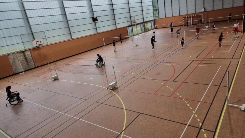 A training session at the badminton club “Les volants de Cergy”, in Cergy-Pontoise, in the suburbs of Paris.